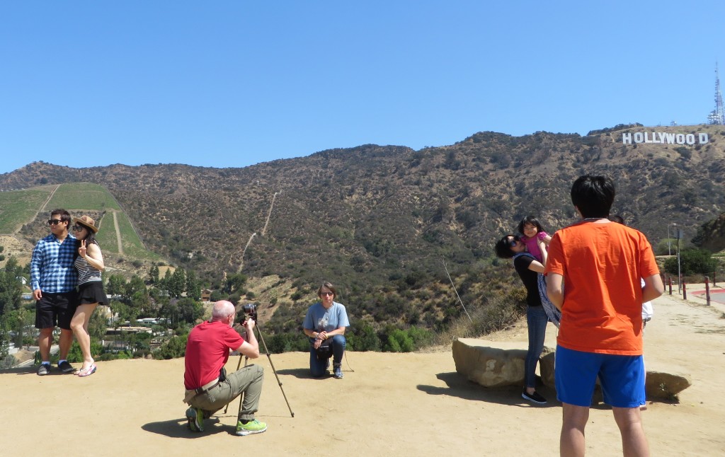 People taking pictures of people taking pictures at the Hollywood sign